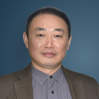 A headshot picture of Dr. Xiaoming (Shawn) He